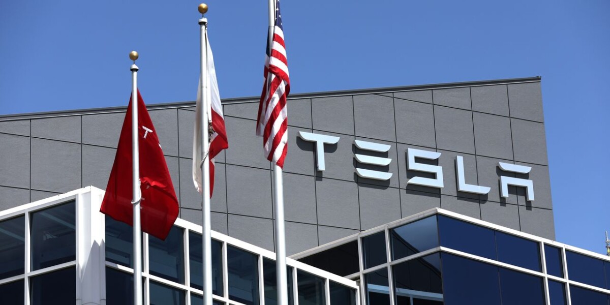 FREMONT, CALIFORNIA - APRIL 20: A sign is posted in front of a Tesla office on April 20, 2022 in Fremont, California. Tesla reported first quarter earnings that far exceeded analyst expectations with revenue of $18.76 billion compared to expectations of $17.80 billion. (Photo by Justin Sullivan/Getty Images)
